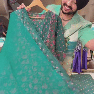 Green Floral Printed Ethnic Dress with Embroidered Neckline and Coordinated Fabric Panel